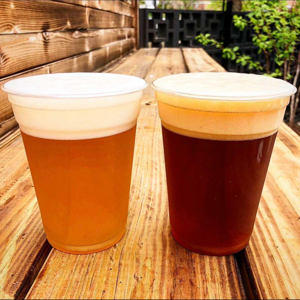 two 12-oz cups of draft beer